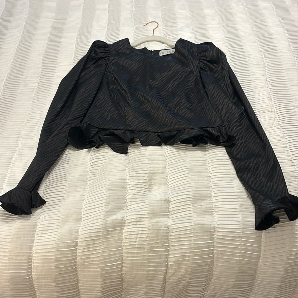 pants store, black long sleeve top